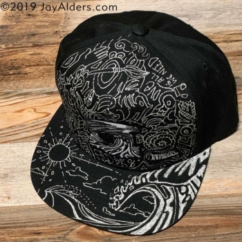 Hand-drawn hat by artist Jay Alders