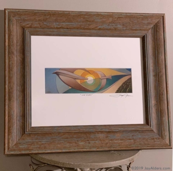 "Love Birds" Art Print in frame by Jay Alders of 2 birds in flight over a beach