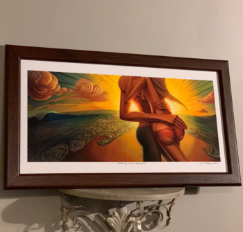 romantic couple on a beach art with sun rays