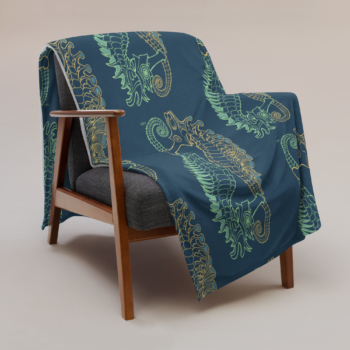Contemporary seahorse design throw blanket in home interior design by artist Jay Alders